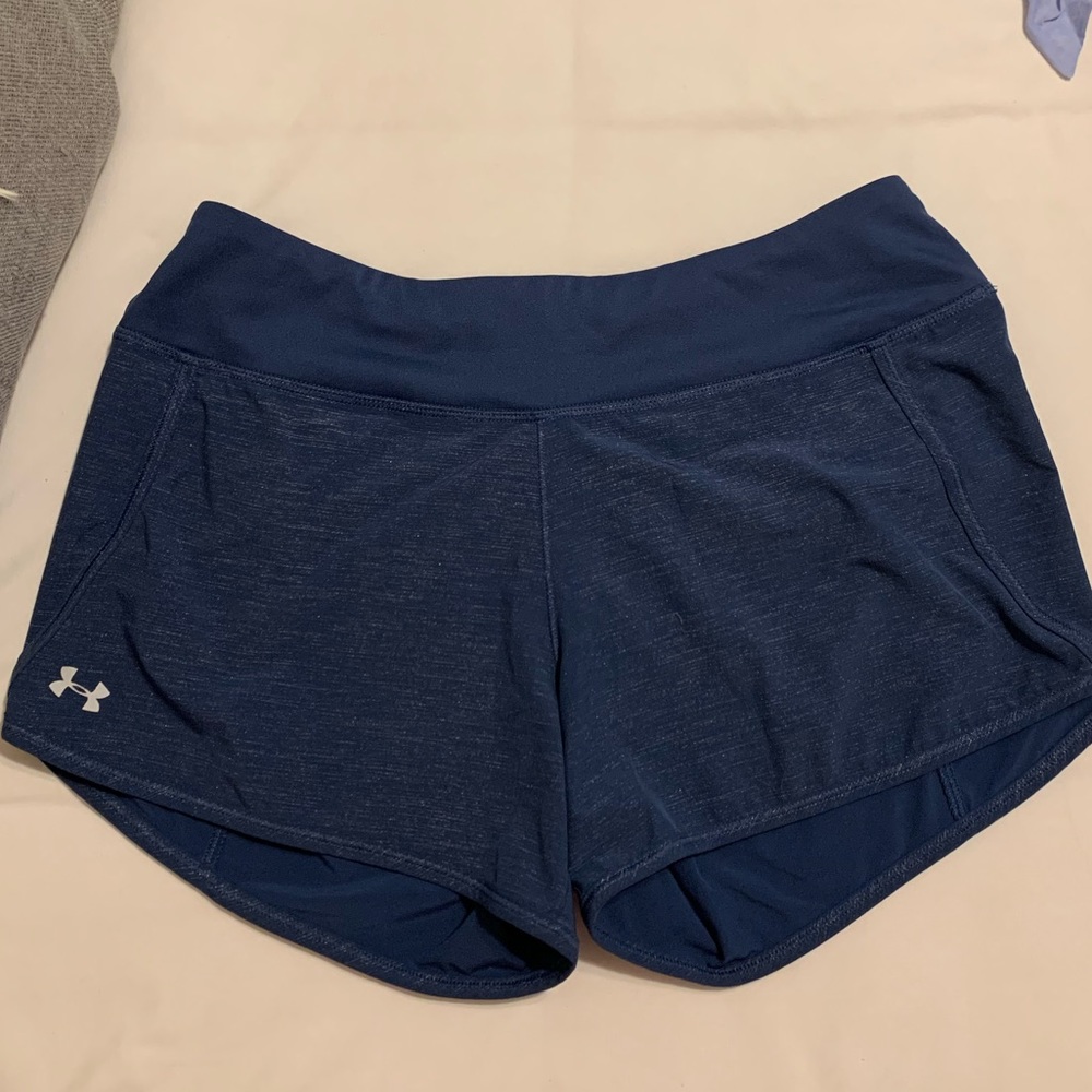 Under Armour heat gear shorts. Metallic navy pattern. Size medium.